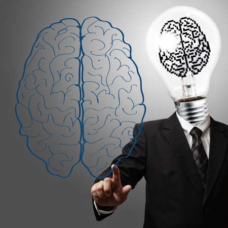 business man light bulb and pixel brain sign head as conceptの写真素材