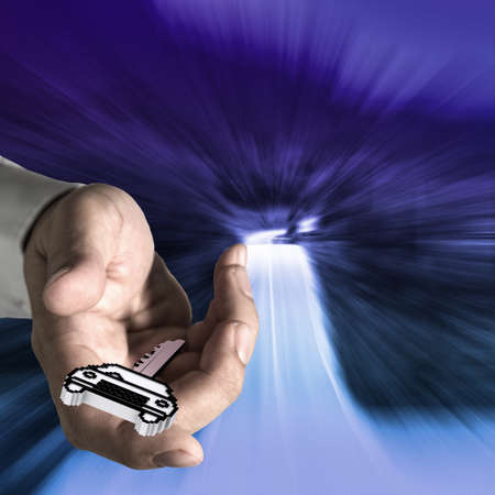 close up of hand offers pixel car key icon as conceptの写真素材