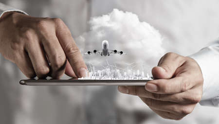 businessman hand holds touch pad conceptの写真素材