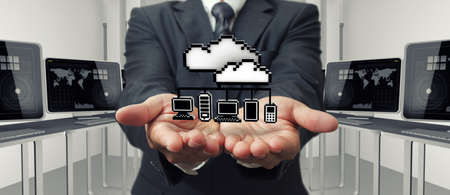 businessman hand shows pixel 3d cloud network sign icon as conceptの写真素材