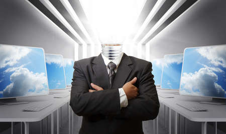 business man light bulb head and computer roomの写真素材
