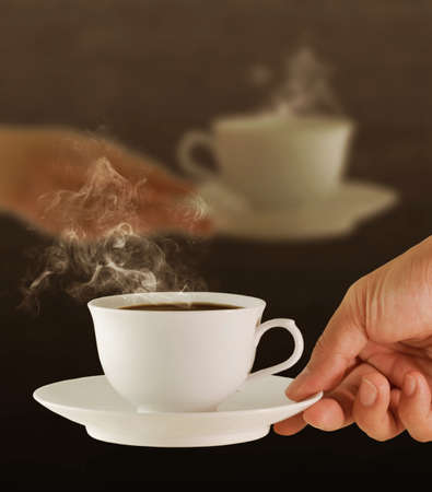  male and female hands, love and coffeeの写真素材