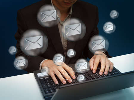 businessman working with laptop send emailの写真素材