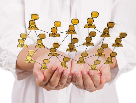 business woman hand holding 3d pixel social network icon as conceptの写真素材