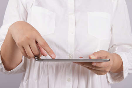 woman with tablet computer as business conceptの写真素材