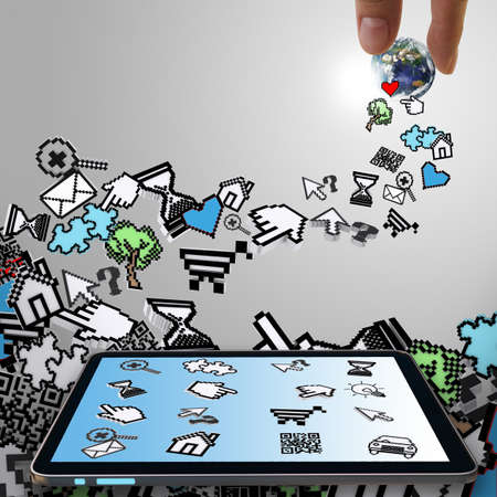 tablet computer with pixel computer icons and hand picks globeの写真素材