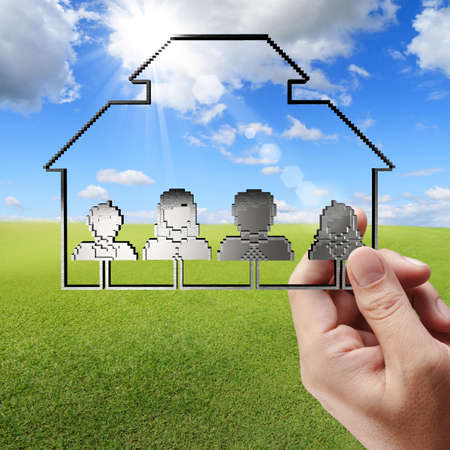 business man hand shows 3d family pixel icon and tablet computer as conceptの写真素材