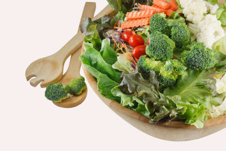 Wooden bowl of mixed saladの写真素材