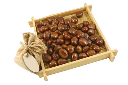 Horizontal image of a pile of chestnuts in a marketの写真素材