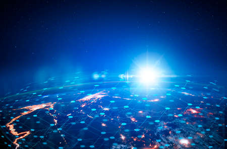 Communication technology for internet business. Global  network and telecommunication on earth cryptocurrency and blockchain and IoT. Elements of this image furnished byの写真素材