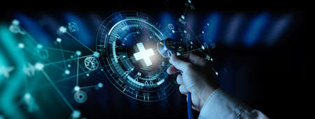 Doctor hand with stethoscope and Ui icon medical in hospital with medical technology network concept.の写真素材