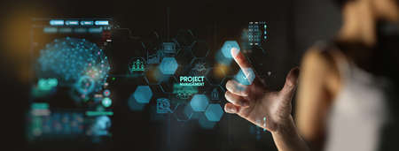 businesswoman hand working with project manager and icons about planning tasks and milestones on schedule, cost management of Ui computerの写真素材