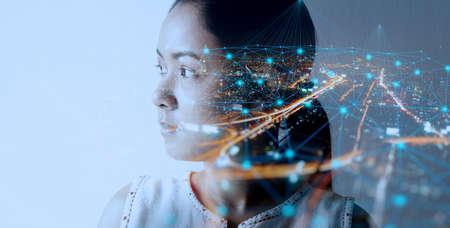 Double exposure of businesswoman and cityscape with Wireless network and Connection technology.の写真素材