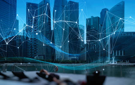 Wireless network and Connection technology concept with Abstract Singapore city backgroundの写真素材