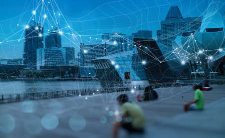 Wireless network and Connection technology concept with Abstract Singapore city backgroundの写真素材