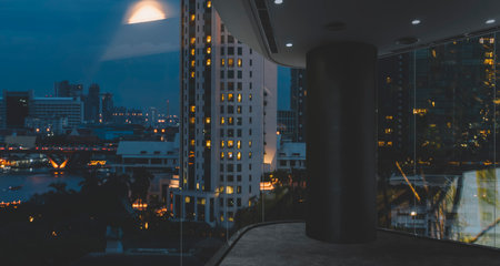 Empty loft unfurnished modern interior office with city skyline and buildings city from glass window.の写真素材