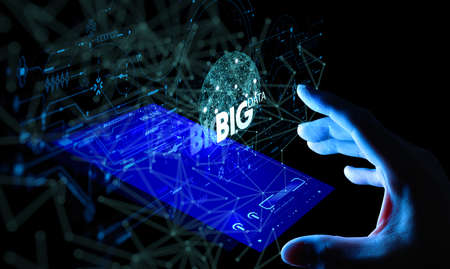 Big data world and globe smart pohone ui with hand selecting and pressing Big Data symbol and modern interface.の写真素材