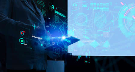 Business data analytics process management with businesswoman hand touching connected gear cogs with...