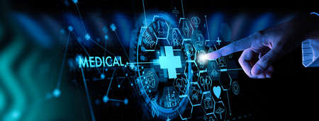 Medicine doctor hand with stethoscope working with icon medical treatment on virtual screen interface computer.の写真素材