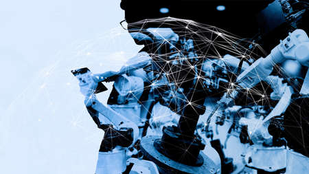 Double explosure of Factory Female Industrial manager Engineer looking at automation robot arms machine in factory industrial on real time monitoring system software.の写真素材