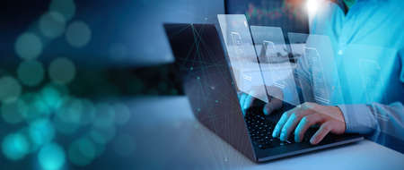 compliance rules and law regulation policy concept businessman working laptop computer on virtual screen, documents with checkbox listsの写真素材