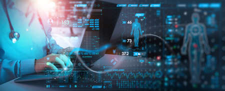 Medicine doctor working laptop computer for medical record of patient on interface. DNA.medical technology and futuristic concept.Digital healthcare and network on modern virtual screen.の写真素材