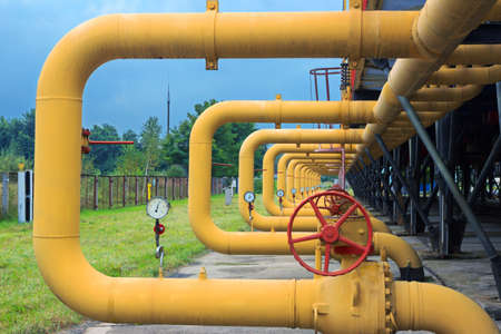 Pipes with valves and manometers on cooling gas compressor station installationのeditorial素材