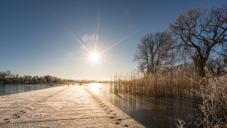 Sunshine over the frozen Schloonsee in Bansin.の写真素材
