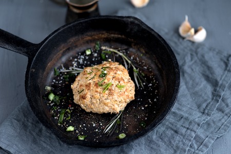 baked cutlet pan greenery garlic on a gray backgroundの写真素材