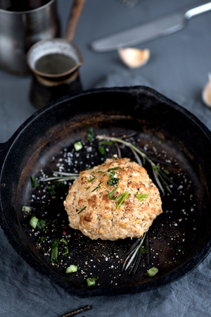 baked cutlet pan greenery on a gray backgroundの写真素材