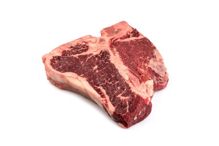 raw Porterhouse steak shadow on white backgroundの写真素材