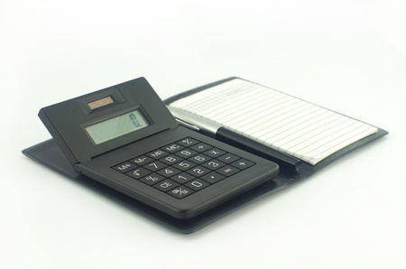  Calculator and note book are ready to calculate costsの写真素材