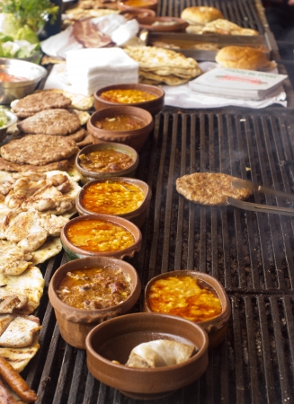 Steaks, burgers and beams on a barbeque on a Balkan way