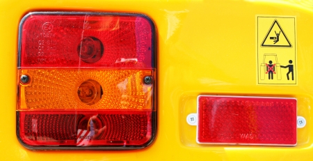 Backlight and warning signs on back of tractor