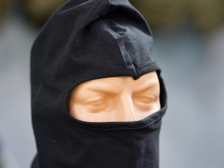 Mask for police forces on a dollの写真素材