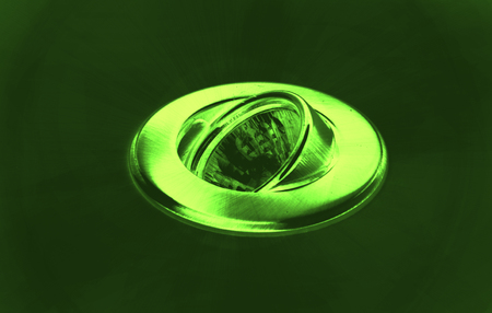 Halogen ceiling light on green background, abstract imageの写真素材