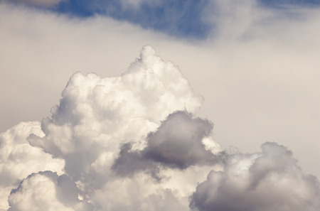White and gray clouds over blue sky, conceptual image