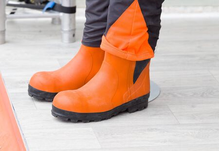 Pair of new protective gummy boots for industrial workersの写真素材