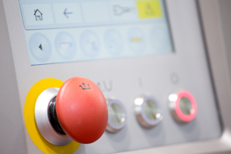 Red button and touch screen display on the machinery in food industryの写真素材