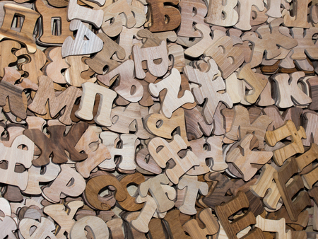 Top view of wooden letters on pie in different colorsの写真素材