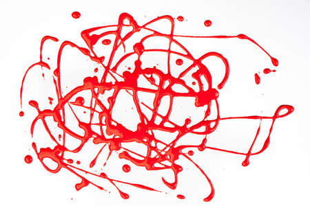 Abstract art and craft with red tempera, made by dripping paint from height