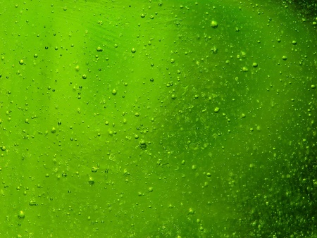 an abstract green drops backgroundの写真素材