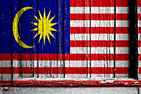 flag of Malaysia painted on wooden frameの写真素材