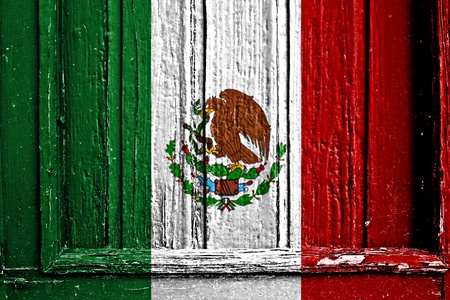 flag of Mexico painted on wooden frameの写真素材