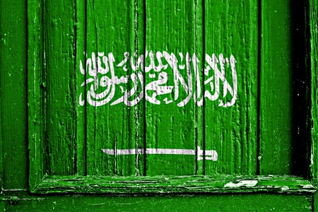 flag of Saudi Arabia painted on wooden frameの写真素材