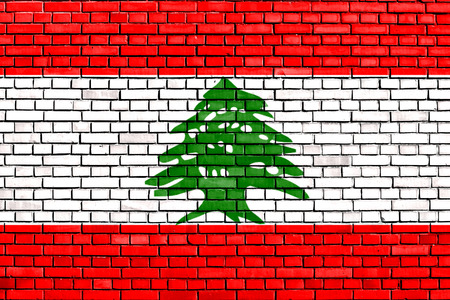 flag of Lebanon painted on brick wallの写真素材
