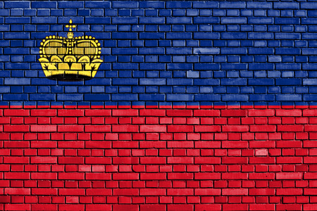 flag of Liechtenstein painted on brick wallの写真素材