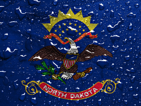 flag of North Dakota with rain dropsの写真素材