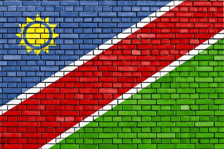 flag of Namibia painted on brick wallの写真素材