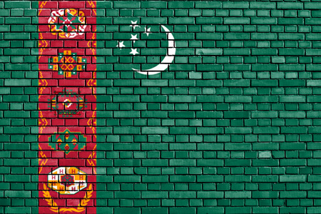 flag of Turkmenistan painted on brick wallの写真素材